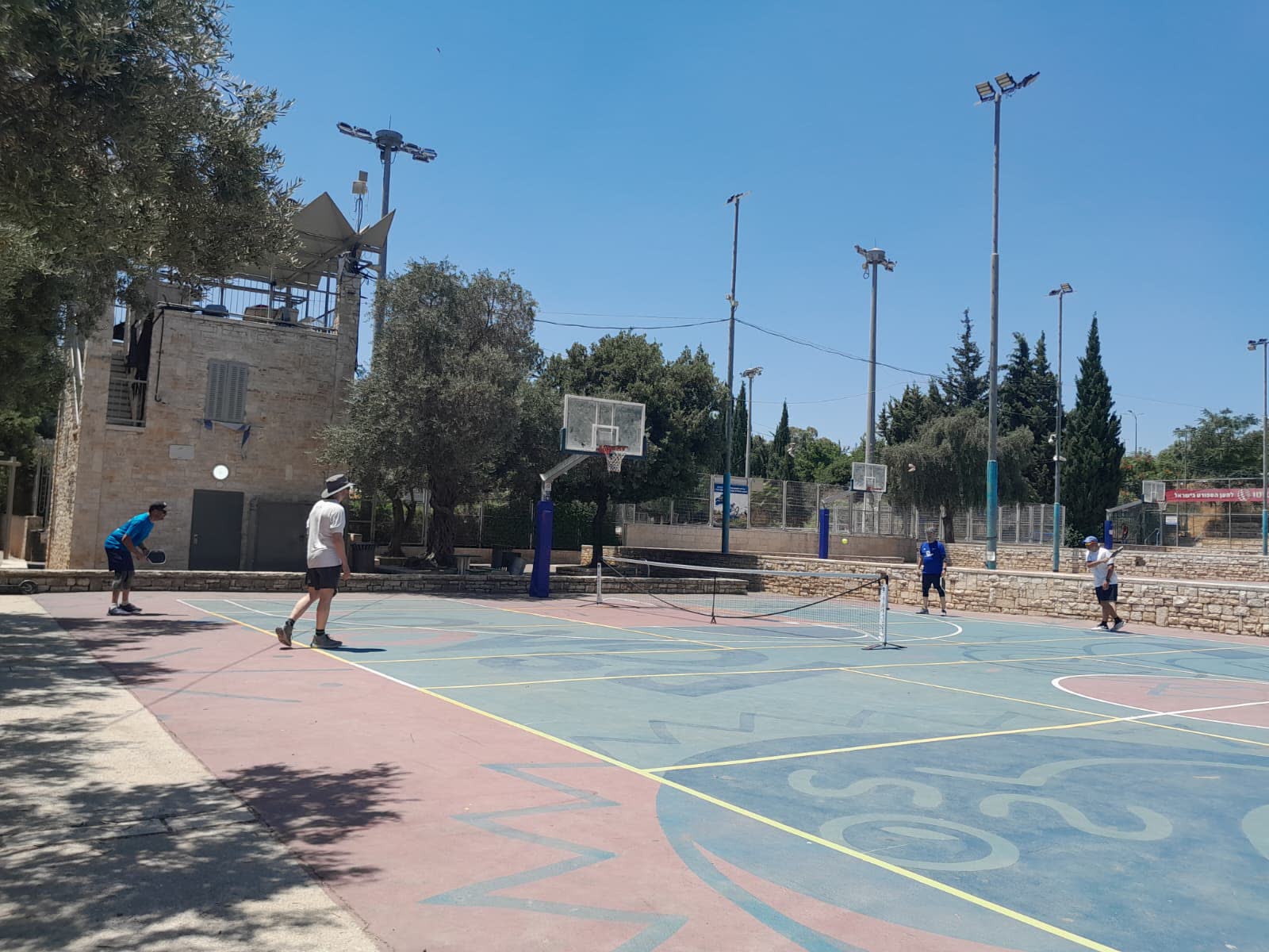 Doubles pickleball game at Gan HaPaamon, Jerusalem