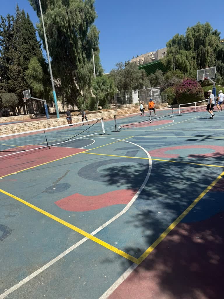 Pickleball match in progress at Gan HaPaamon courts, Jerusalem